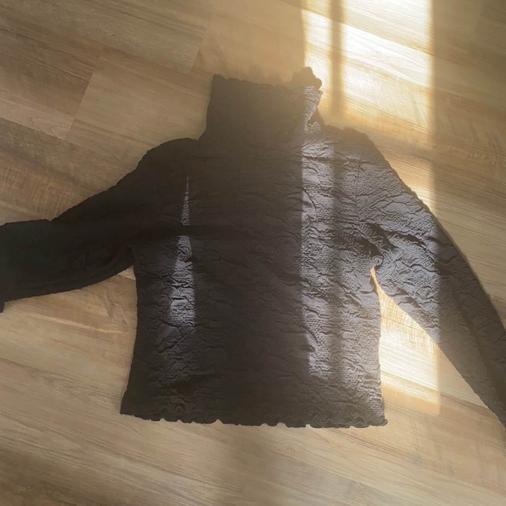 Black turtleneck sweater